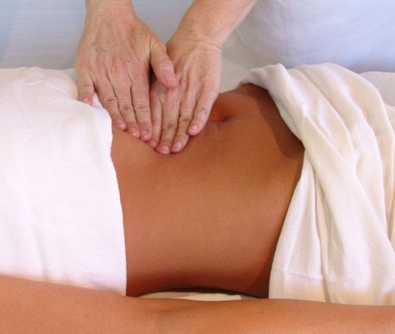 Cách giảm béo bụng hiệu quả bằng thuật massage bấm huyệt