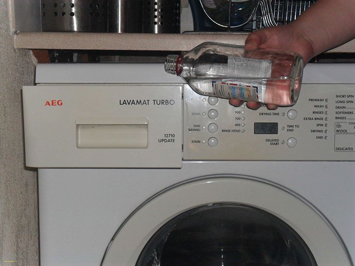 Vệ sinh máy giặt bằng nước javen